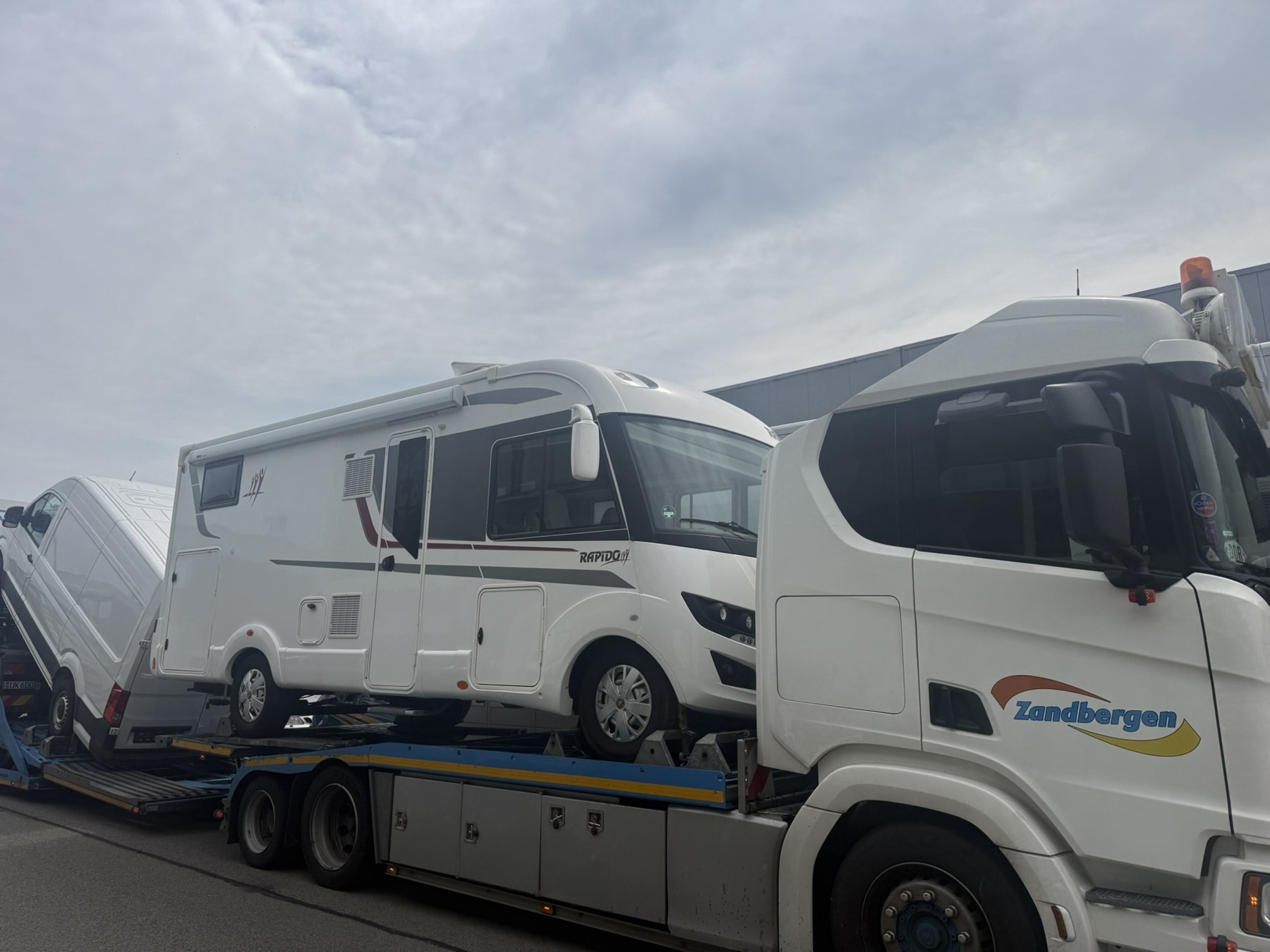 No.001 arrives on the vehicle transporter